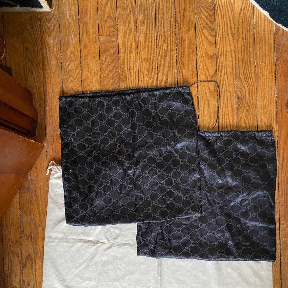 1 Prada, 2 Gucci dust bags